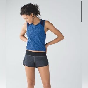 P51. Lululemon Speed Short
Size 8
Heathered Black / Black / Lakeside Blue